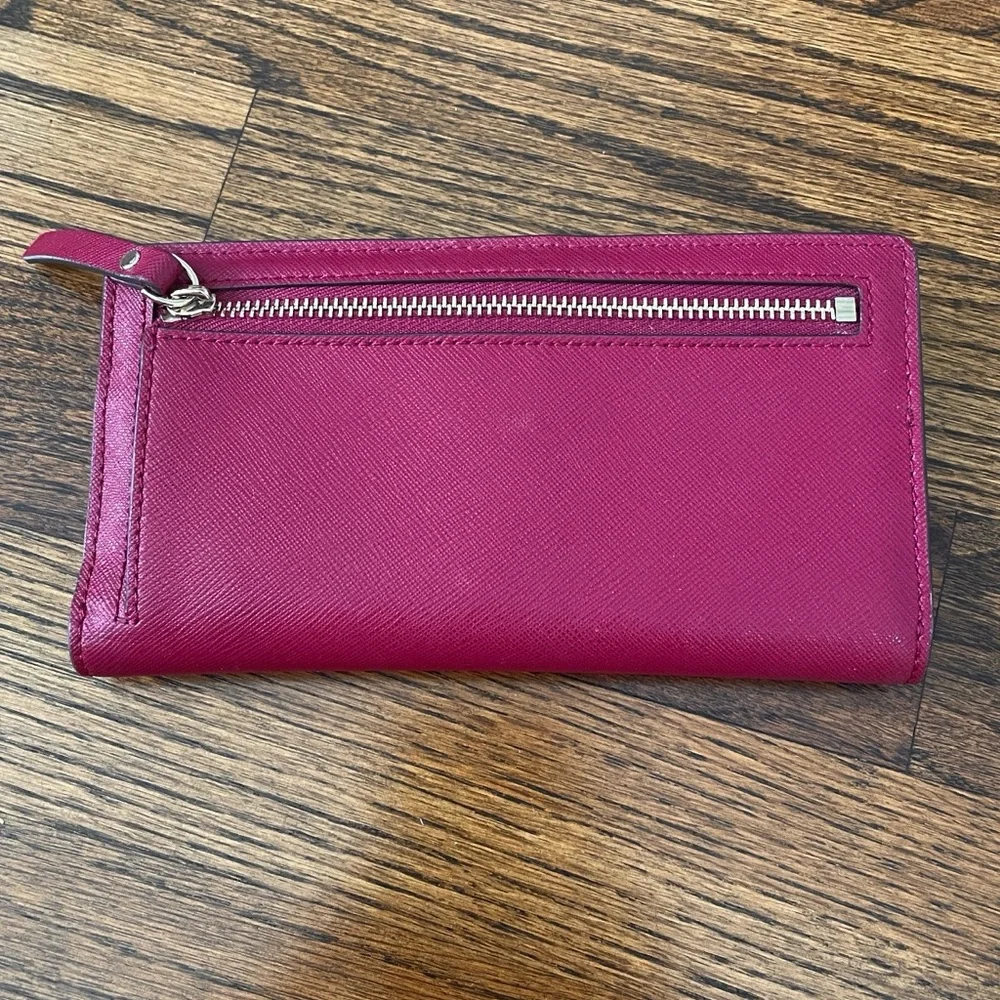 Kate Spade Leather Snap Closure Bi-Fold Wallet in Wine Color